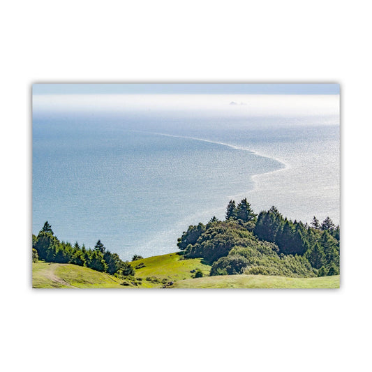 A scenic view of a lush green hillside overlooking a vast body of water, with a clear blue sky above. Mount Tamalpais Art Print Marin County with Farallon Islands View