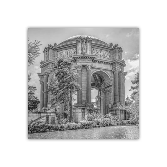 A black and white photograph of a large, ornate building with a domed roof and columns, surrounded by trees and a body of water. Palace of Fine Arts San Francisco Black & White Art Print | SF Photo