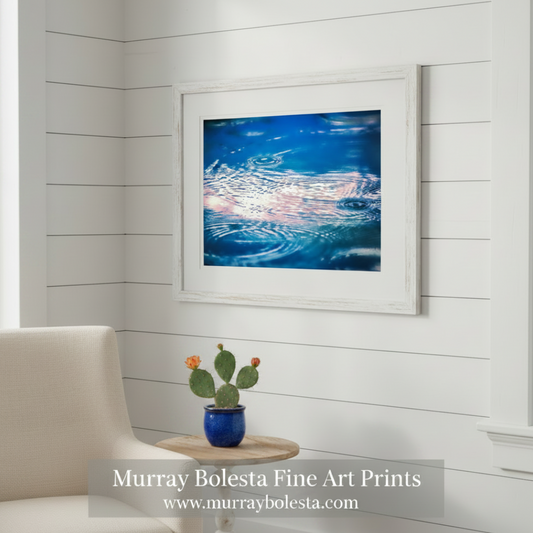Ripples on water surface with colorful reflection. Fine Art Nature Photography with Raindrops in Indigo Blue by Murray Bolesta
