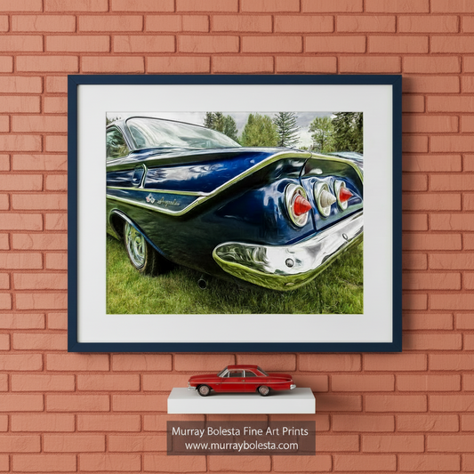 A blue and silver classic car parked on a grassy field, with trees in the background. Vintage Chevy Impala Blue Classic Car Art Print Guy Gift by Murray Bolesta