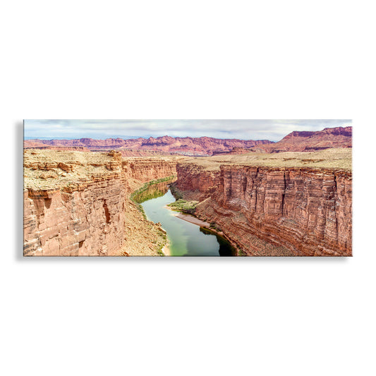 a stunning canyon landscape with towering red rock walls and a serene river flowing through the valley. Grand Canyon Panorama Art at Navajo Bridge Marble Canyon Arizona