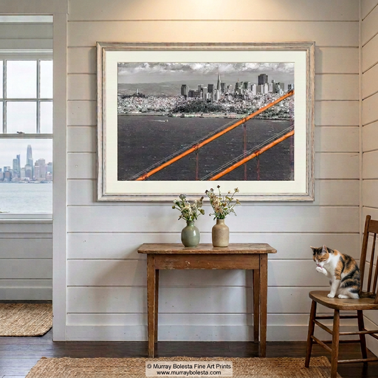 Orange Golden Gate Bridge intervenes in a San Francisco cityscape artwork in black & white, by Murray Bolesta.