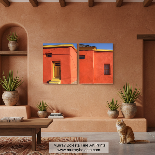 Tucson Arizona Adobes by Murray Bolesta! A two-panel canvas wall art print depicting a warm terracotta building under a blue sky, displayed on a stucco wall in a styled room with potted plants, a wooden bench, and an orange cat. A watermark at the bottom reads 'Murray Bolesta Fine Art Prints www.