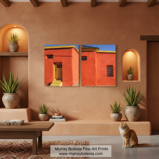 Tucson Arizona Adobes by Murray Bolesta! A two-panel canvas wall art print depicting a warm terracotta building under a blue sky, displayed on a stucco wall in a styled room with potted plants, a wooden bench, and an orange cat. A watermark at the bottom reads 'Murray Bolesta Fine Art Prints www.