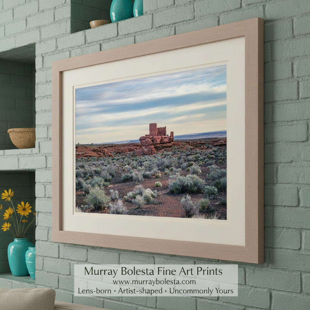 Desert landscape with a prominent red rock formation under a blue sky. Native American Cliff Dwelling Picture in Arizona Red Rock Desert Landscape by Murray Bolesta