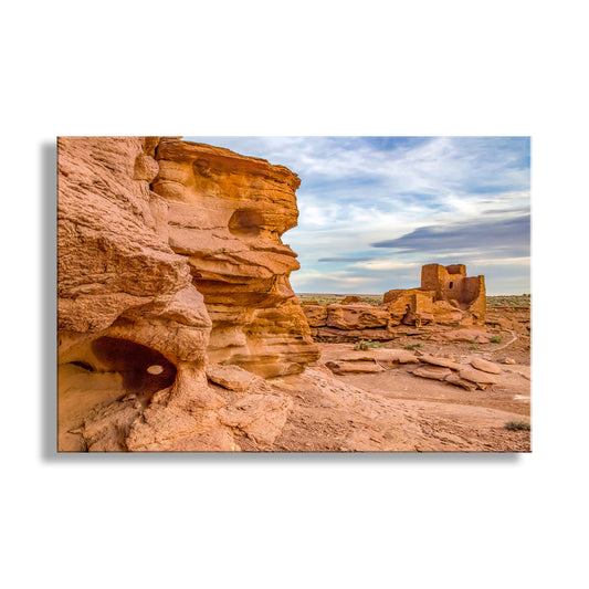 Desert landscape with rock formations and a cloudy sky. Wupatki Pueblo Ruins Print - Arizona Native American Landscape