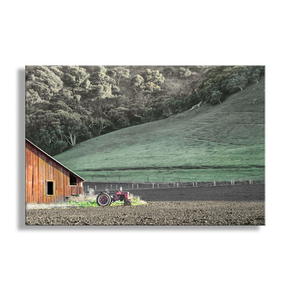 Wooden barn with a red tractor on a plowed field with green hills in the background. Red Barn & Old Tractor in Lompoc California Farm Landscape | Santa Barbara County