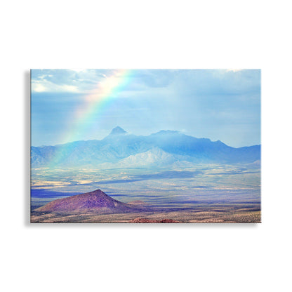 Desert landscape with a rainbow and mountains in the background. Rainbow Photograph with Desert Landscape and Baboquivari Peak Arizona