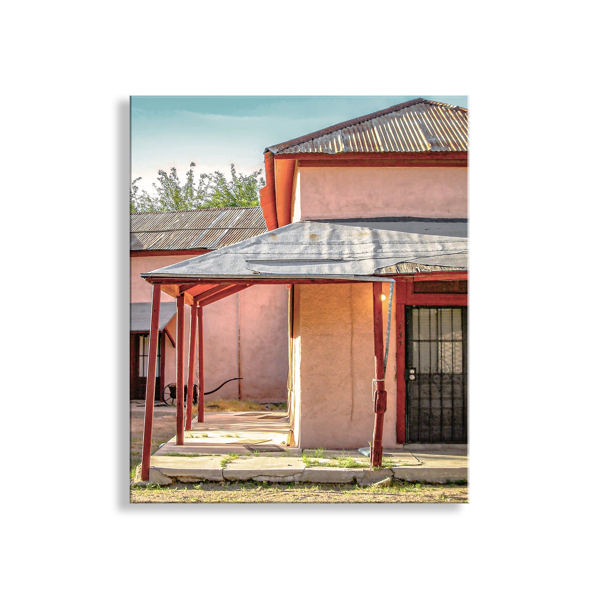 Traditional building with a red roof and wooden porch in a rural setting. Old Tucson Barrio Viejo Architecture Art Print – Southwestern Style Wall Décor