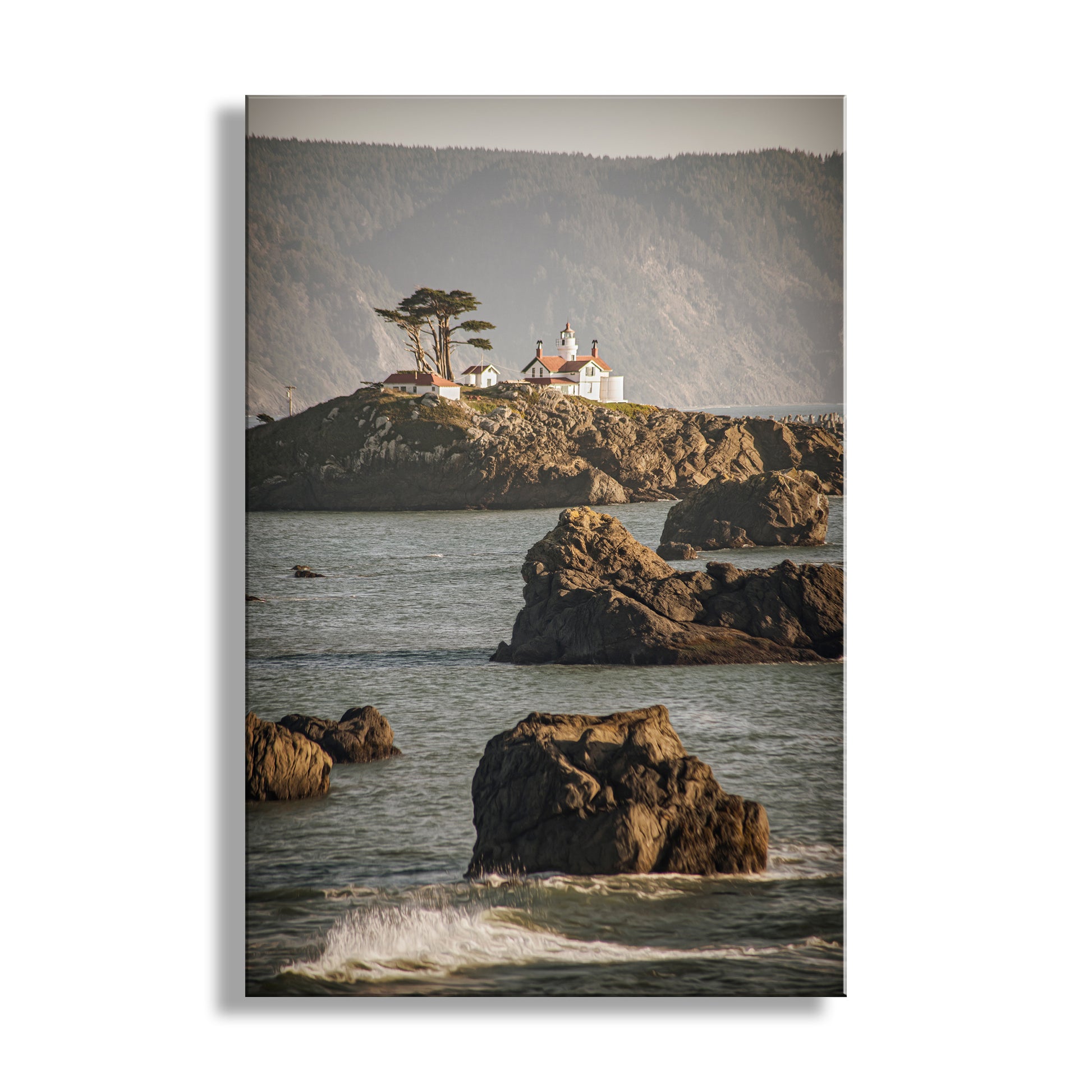 Lighthouse on a rocky outcropping with ocean waves in the foreground. Beautiful Crescent City! For your walls, my cool lighthouse art of Crescent City California. In the heart of Northern California's redwood coast, it's Del Norte County and the North Coast. This was one of the earliest lighthouses constructed on the USA West Coast, soon after California became a state! Original, unique signed art photograph by Murray Bolesta.