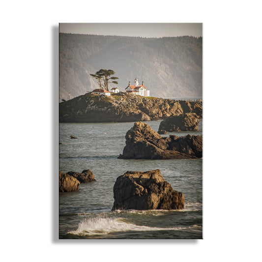 Lighthouse on a rocky outcropping with ocean waves in the foreground. Beautiful Crescent City! For your walls, my cool lighthouse art of Crescent City California. In the heart of Northern California's redwood coast, it's Del Norte County and the North Coast. This was one of the earliest lighthouses constructed on the USA West Coast, soon after California became a state! Original, unique signed art photograph by Murray Bolesta.