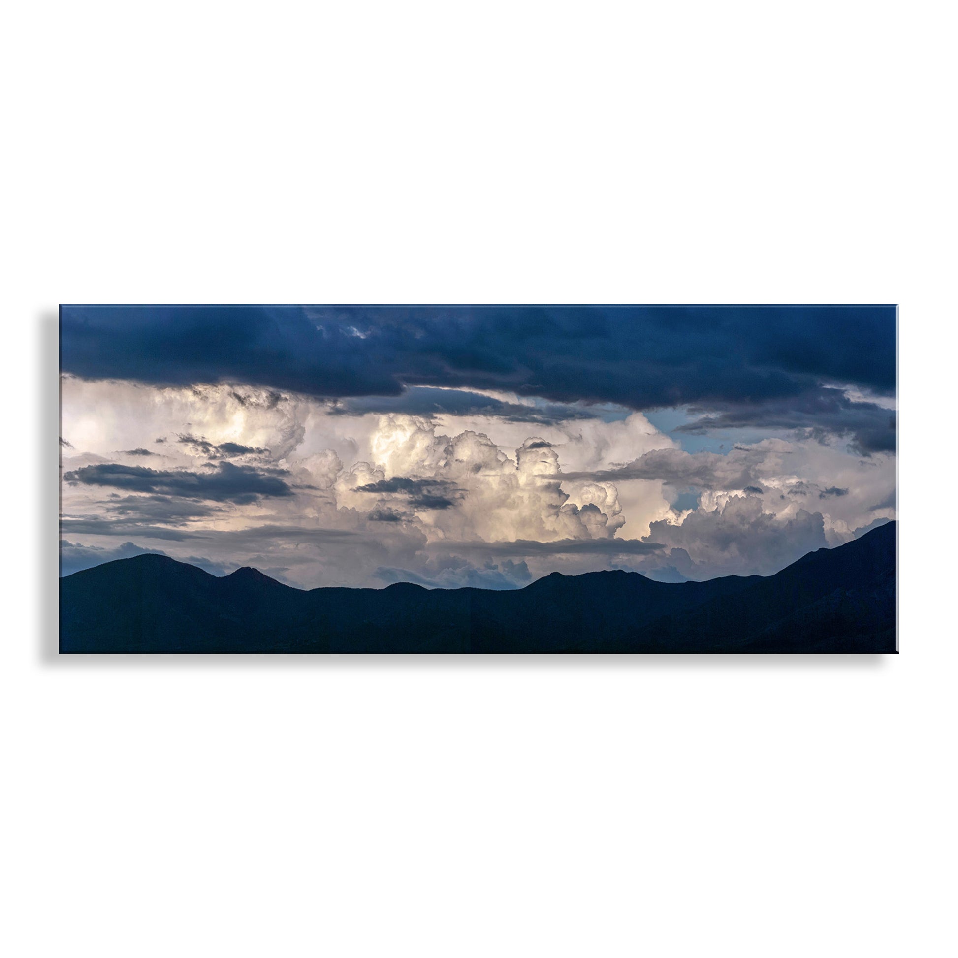Panoramic view of mountains under a dramatic sky with clouds. Indigo Wall Art with Tucson Arizona Monsoon Storm Clouds Panorama