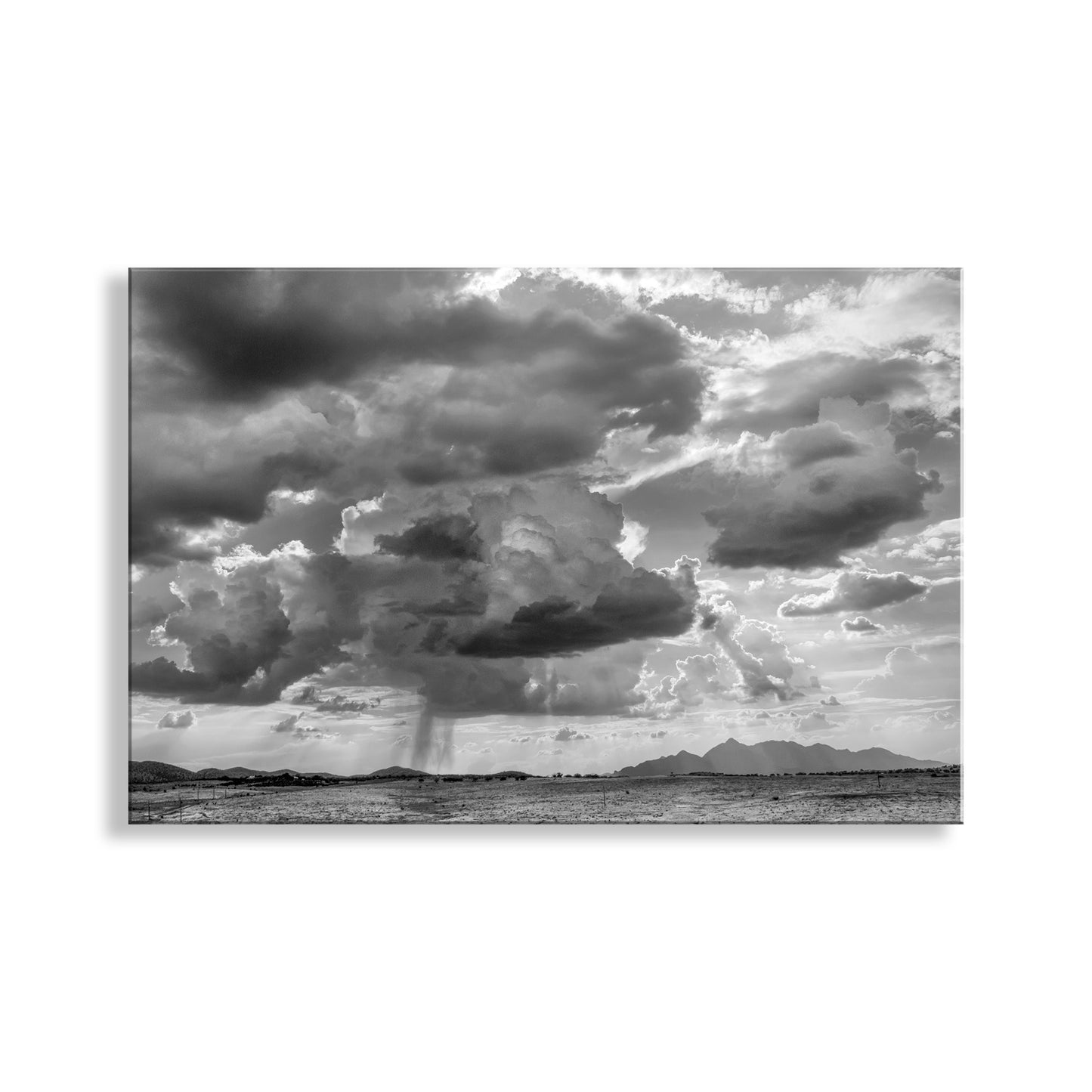 Black and white photograph of a dramatic sky with large clouds over a landscape. Black & White Fine Art Print | Southern Arizona Desert Storm Landscape