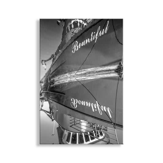Black and white photo of a boat with 'Bountiful' written on it. Crescent City California Harbor Abstract Boat Photograph in Black & White