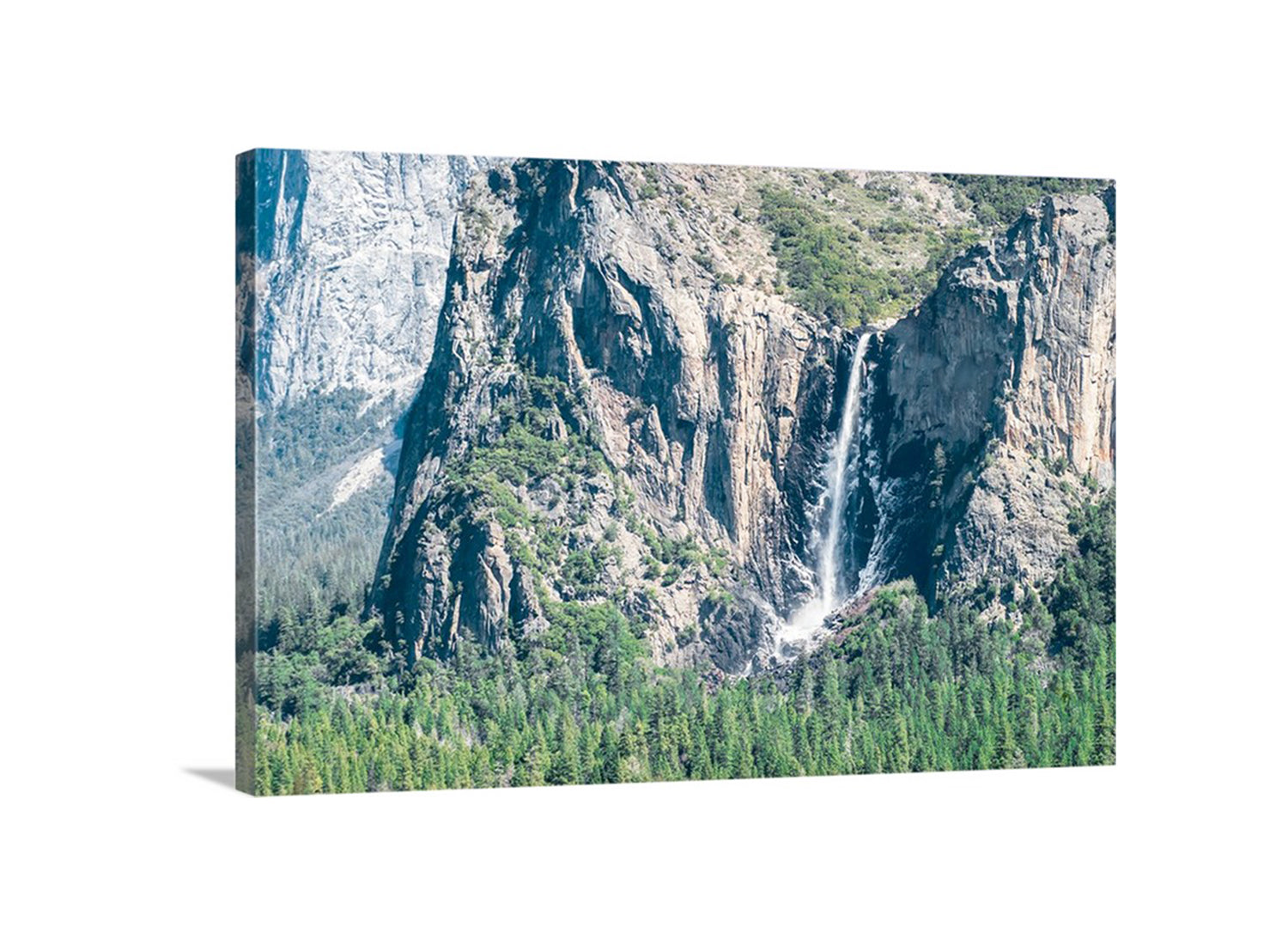 My beautiful Yosemite Valley picture from early spring for your viewing pleasure! This is magnificent Bridalveil Fall with some icy spray.