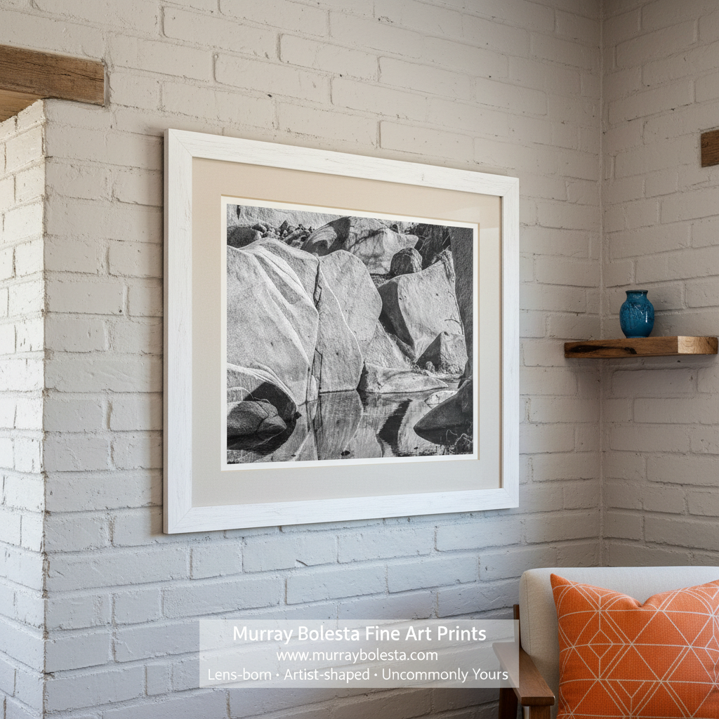 Black and white photograph of large rocks with reflections in water. Wilderness Creek Art | Tucson Desert Canyon Water in Black & White by Murray Bolesta