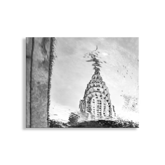 Black and white photograph of a tall building with a pointed roof. New York City Chrysler Building Art Print in Abstract Black & White
