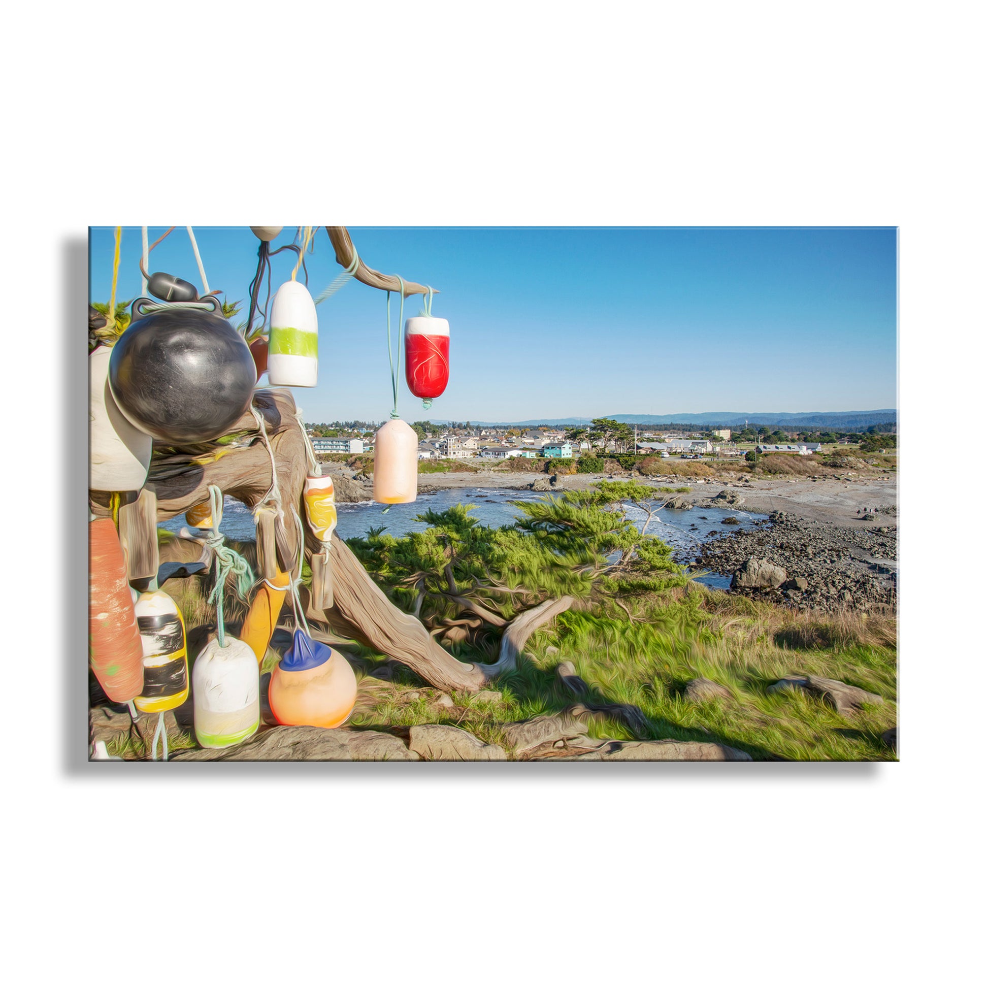 Beach scene with colorful buoys and driftwood, overlooking a coastal town.  My cool Crescent City California art print for your viewing pleasure! It's in the heart of Northern California's redwood coast, Del Norte County, and the North Coast. Colorful boat fenders dot the foreground of this historic waterfront community. Original, unique signed art by Murray Bolesta.