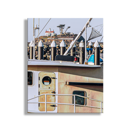 Yacht with a lighthouse in the background on a clear day. Crescent City Harbor Art Print | Fishing Trawler & Battery Point Lighthouse