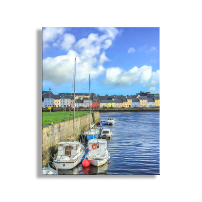 Harbor scene with boats and colorful houses under a blue sky. Galway Harbor Ireland Claddaugh Quay Art | Quaint Fishing Village & Boats
