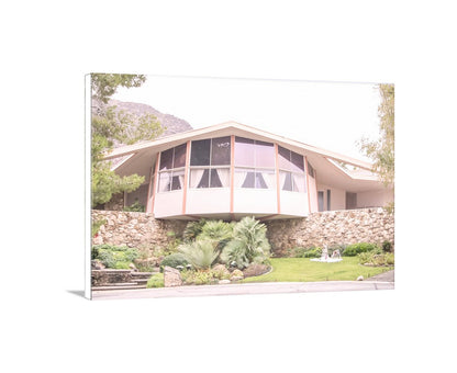Modern house with stone foundation and glass windows in a garden setting. Elvis Presley Palm Springs House Mid Century Art Print