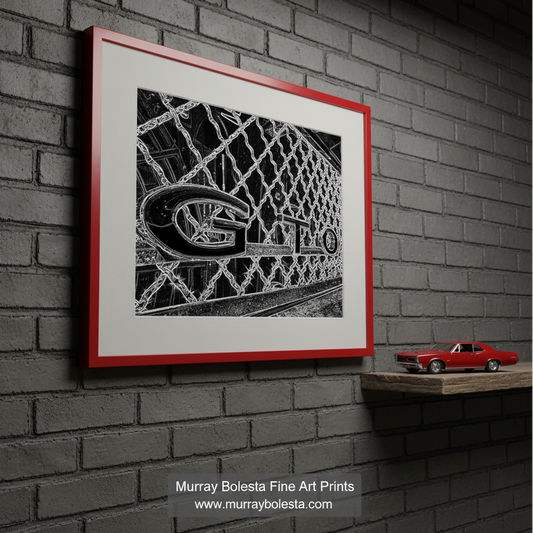 a close-up view of a chain-link fence with the word "GTO" prominently displayed in the center. Pontiac GTO Black & White Muscle Car Art Print Wall Decor by Murray bolesta