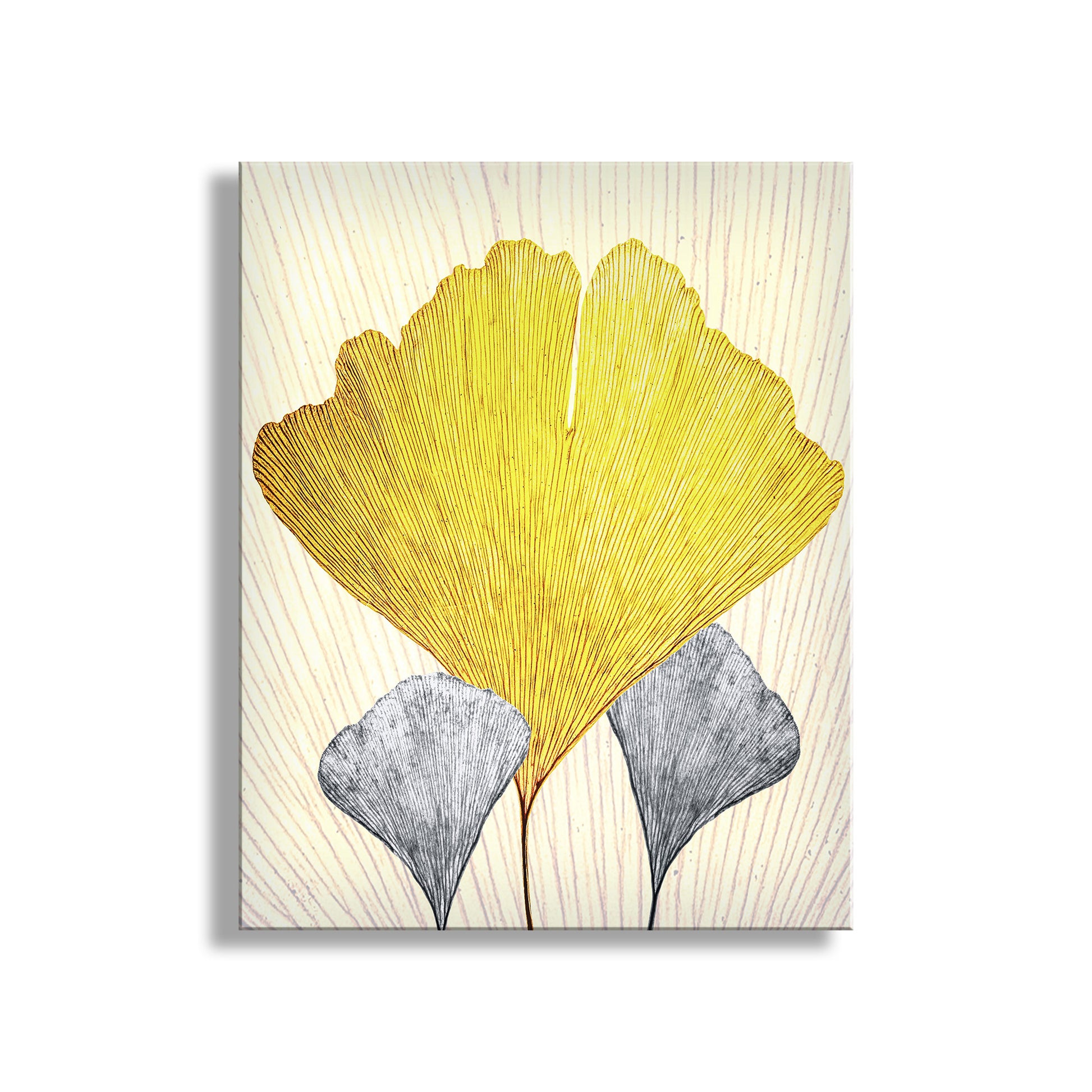 Decorative wall art with yellow, gray, and white leaves on a textured beige background. Gingko Leaf Art as Fine Art Nature Wall Decor