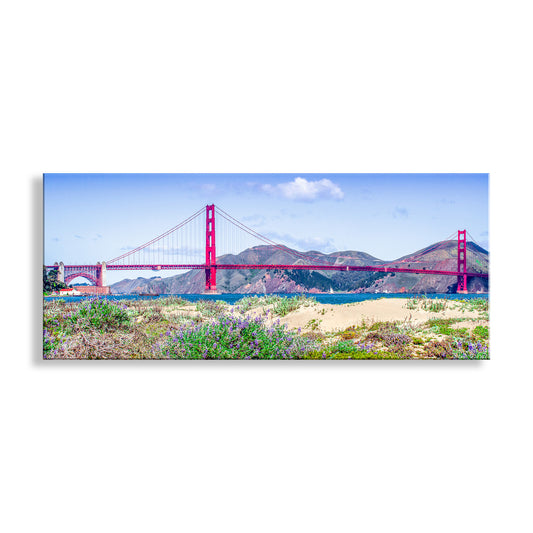 Panoramic view of the Golden Gate Bridge with mountains and water in the background.
My precious Presidio wildflower and sand dune panoramic art print at San Francisco California! The mighty Golden Gate lies beyond this rare remnant of the original landscape which long ago covered much of the San Francisco peninsula. Major restoration of nature is one of the great benefits of the new Presidio National Park. Original, unique signed art by Murray Bolesta!