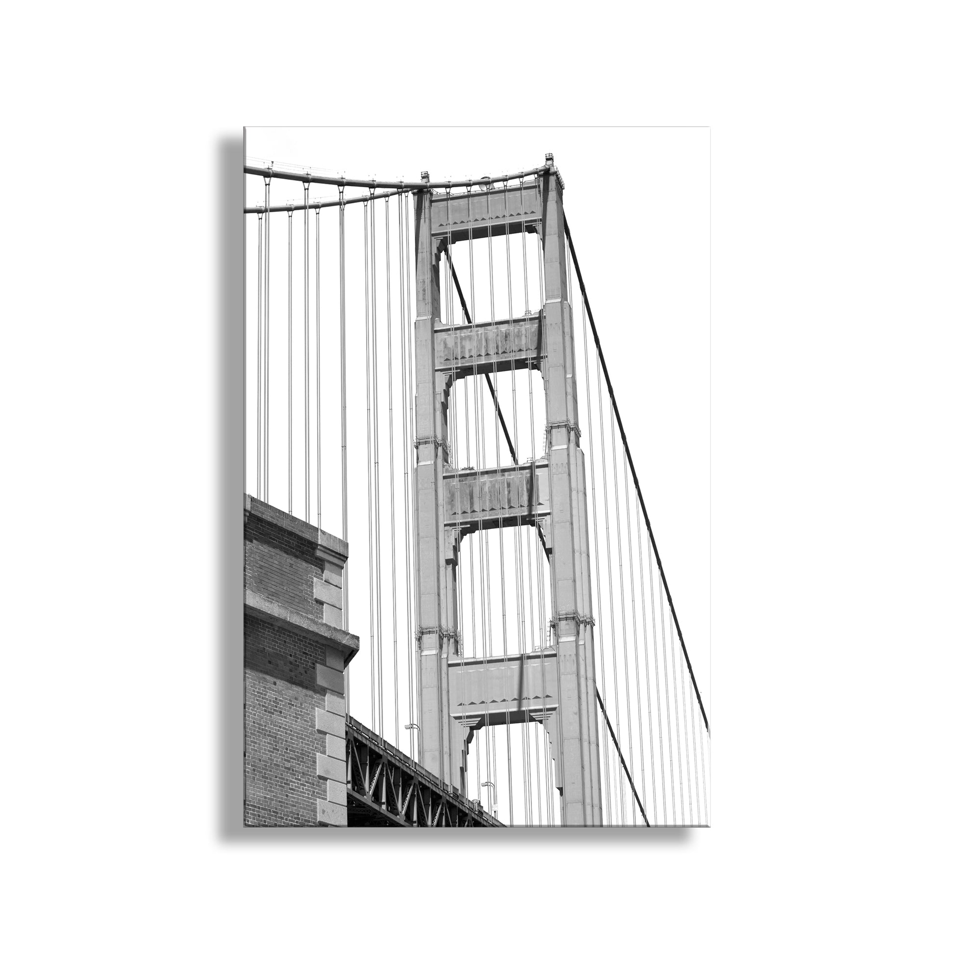 Black and white image of a bridge with a white background. Beautiful Golden Gate! My splendid San Francisco Golden Gate Bridge picture in a vertical print! Here's the powerful shape of an icon of the City by the Bay, with Fort Point peeking out on the left. Original, unique signed art by Murray Bolesta