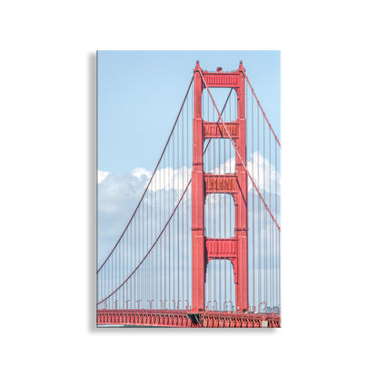 Red Golden Gate Bridge against a blue sky with white clouds. My splendid San Francisco Golden Gate Bridge photo in minimalist style! Here's the famous shape of an icon of the City by the Bay, in a muted orange for your pleasure.&nbsp; Original, unique signed art by Murray Bolesta.