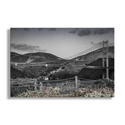 Mighty Marin Headlands! My unique Golden Gate Bridge art for your walls: the giant bridge at the center of a scene with Marin County and a graceful sailboat. I captured this image from the precious restored dunes &amp; native wildflowers of the Presidio of San Francisco National Park! This photograph features muted gray tones with a hint of color, and artful grain. Original, unique signed art by Murray Bolesta.