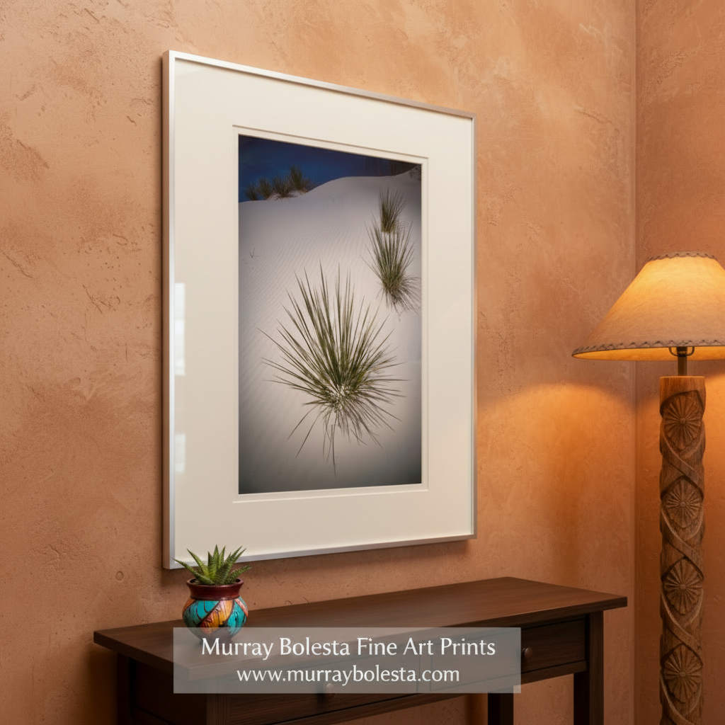 a serene landscape with a white sandy hillside dotted with small green plants or grasses, creating a sense of tranquility and natural beauty. Yucca Agave Desert Print - White Sands New Mexico Botanical Wall Art by Murray Bolesta