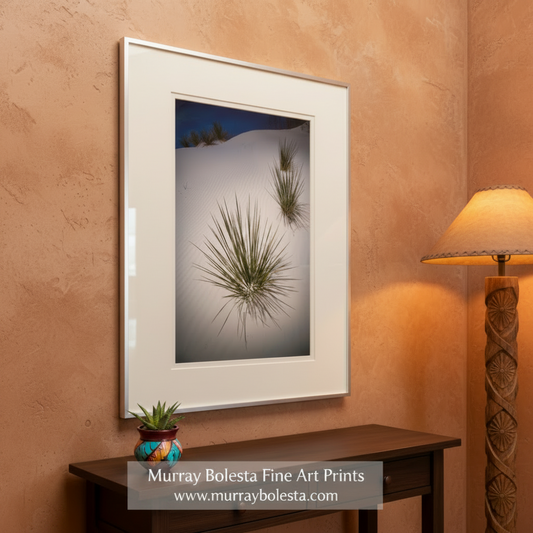 a serene landscape with a white sandy hillside dotted with small green plants or grasses, creating a sense of tranquility and natural beauty. Yucca Agave Desert Print - White Sands New Mexico Botanical Wall Art by Murray Bolesta