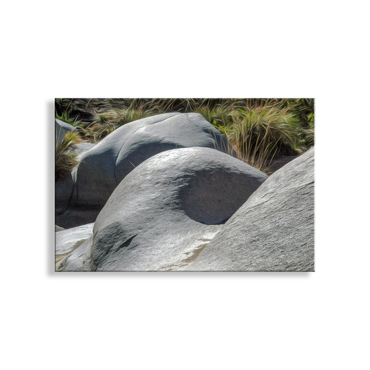 Close-up of large gray rocks with grass in the background. Madera Canyon Arizona Fine Art Nature Print with Flowstone