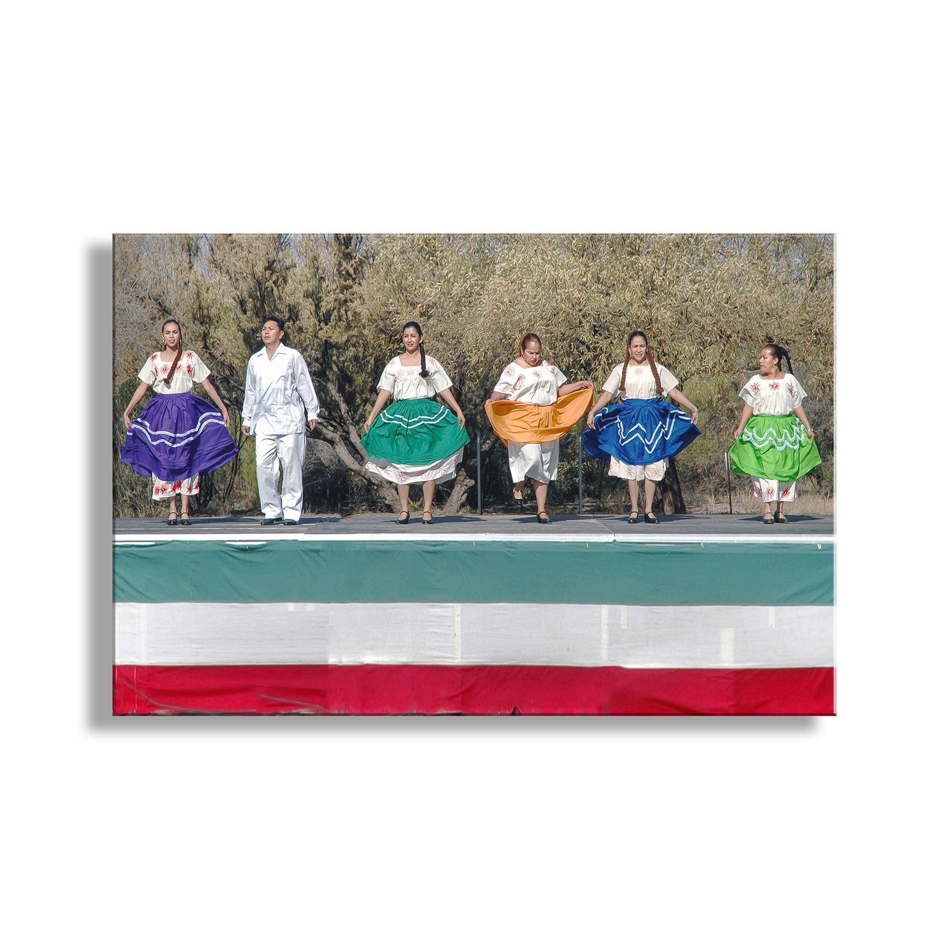 Group of people in colorful traditional outfits standing in front of a Mexican flag. Mexican Fiesta Folklorico Dancing Art Print at Mexico Arizona Border