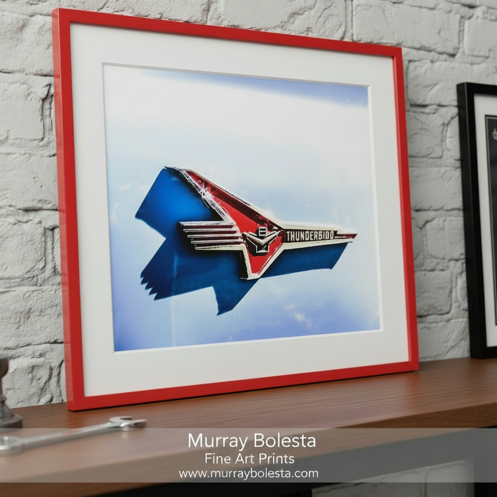 a red and white Thunderbird emblem against a blue background. Classic Ford Thunderbird Car Art Print - Vintage Automotive by Murray Bolesta