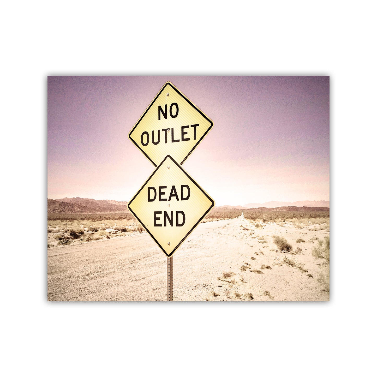 Two road signs in a desert landscape with 'No Outlet' and 'Dead End' text. My funky picture of a seemingly endless road, but not quite! Captured on camera by me in the great American western desert. Original, unique signed art by Murray Bolesta!