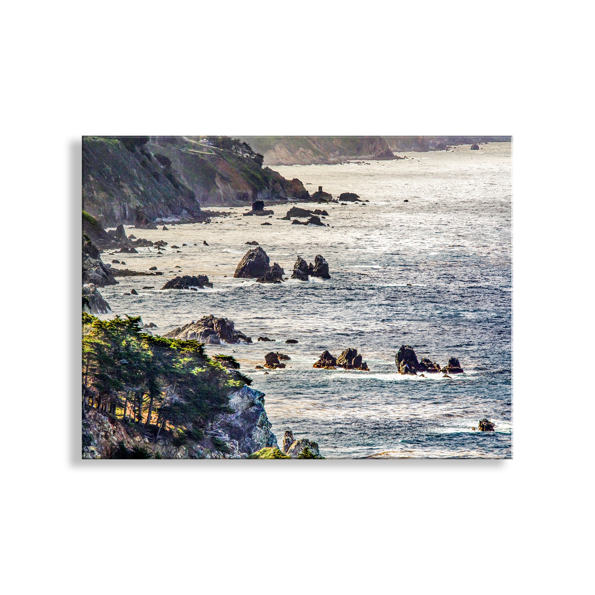 Coastal scene with rocky cliffs and ocean waves on a white background. Big Sur California Coast Ocean Photography on Framed Canvas