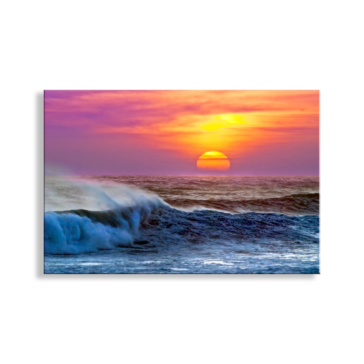 Sunset over the ocean with colorful sky and crashing waves. Ocean Waves Sunset Photograph at Jalama Beach California
