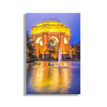 Ornate building illuminated at night with a fountain in front, reflected in water. Beautiful Presidio Park! For your walls, my magnificent picture of the Palace of Fine Arts at dusk, San Francisco California. Original, unique signed art by Murray Bolesta.