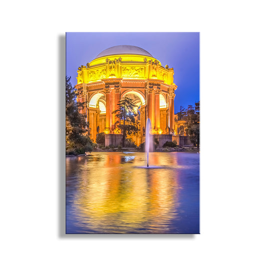 Ornate building illuminated at night with a fountain in front, reflected in water. Beautiful Presidio Park! For your walls, my magnificent picture of the Palace of Fine Arts at dusk, San Francisco California. Original, unique signed art by Murray Bolesta.
