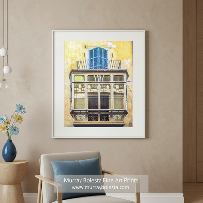 Decorative wall art of a balcony with blue shutters on a yellow background. Palma de Mallorca Spain Architecture Art Print by Murray Bolesta