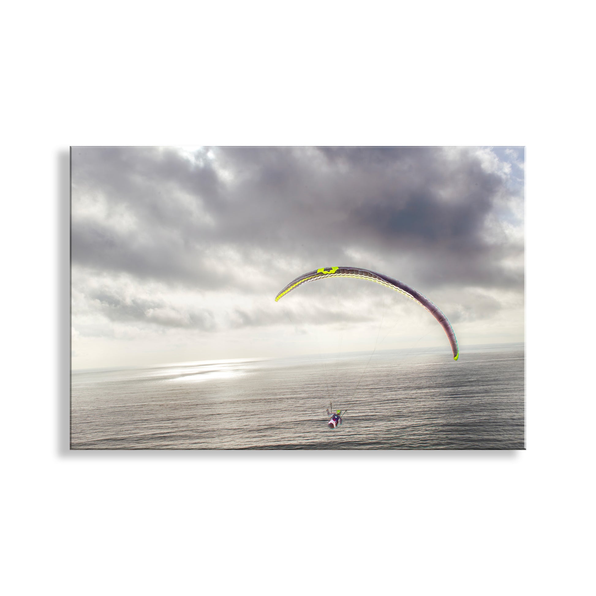 Parasail over a body of water with a cloudy sky. Paraglider Art Print at Torrey Pines San Diego California