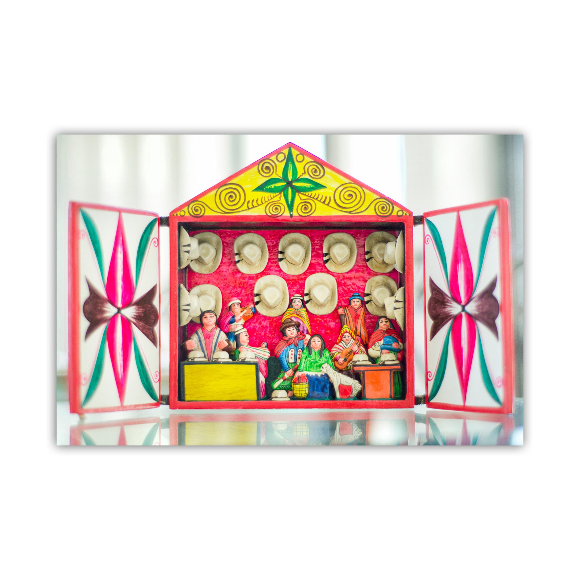 Colorful toy set with open doors showing figures and instruments on a white background. Peruvian Retablo Fine Art Print for Home or Office Decor