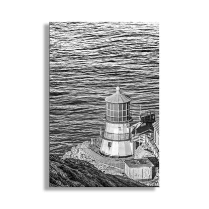 Black and white illustration of a lighthouse on a rocky shore with wavy water. Point Reyes California Lighthouse Photo Print in Black & White