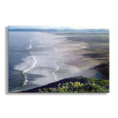 Landscape with a river flowing through a valley, surrounded by greenery and mountains. My phenomenal Point Reyes seascape for your walls! The Pacific seacoast sprawls forward from a hiking trail beyond the wildflowers. This scene was captured by me on a sublime spring morning! Original, uniqued signed art by Murray Bolesta.