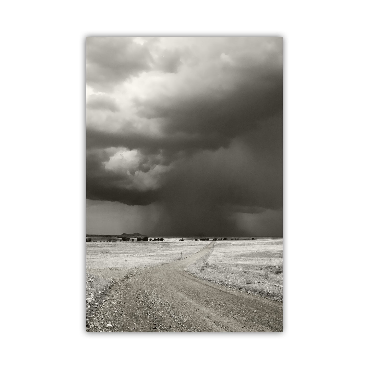 Stormy sky over a dirt road in a desert landscape. Southwest Monsoon Storm | Arizona Ranch Landscape Art | Rustic Country Roads