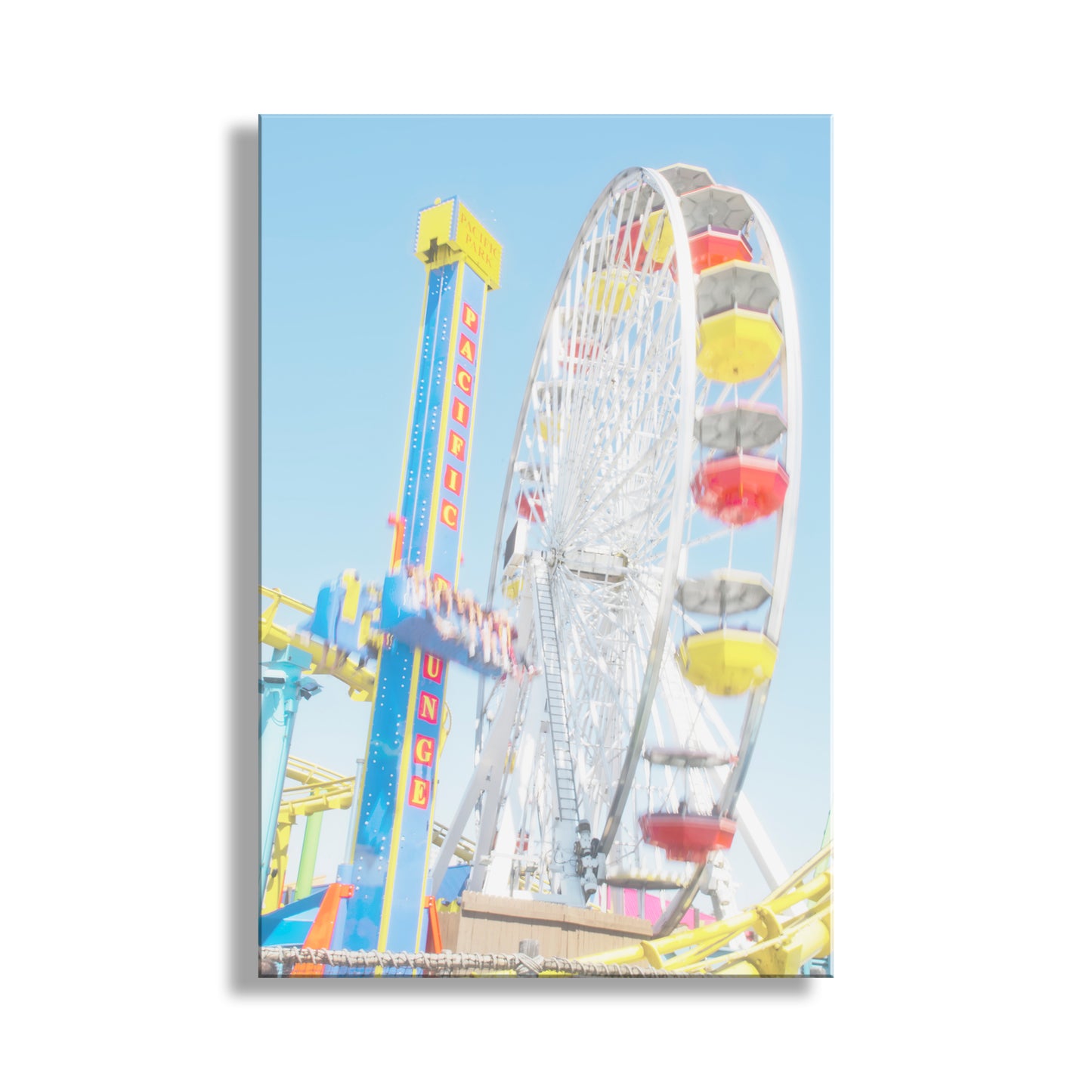 Ferris wheel and roller coaster against a blue sky.  Beautiful carnival art! My pretty pastel picture of the Santa Monica Pier Ferris wheel. Come take the Pacific Plunge at this Los Angeles fun spot! Original, unique signed art by Murray Bolesta!