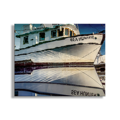 Reflective surface showing a boat named 'Sea Hunter' with clear blue sky. Fishing Boat Print Crescent City California as Nautical Wall Decor