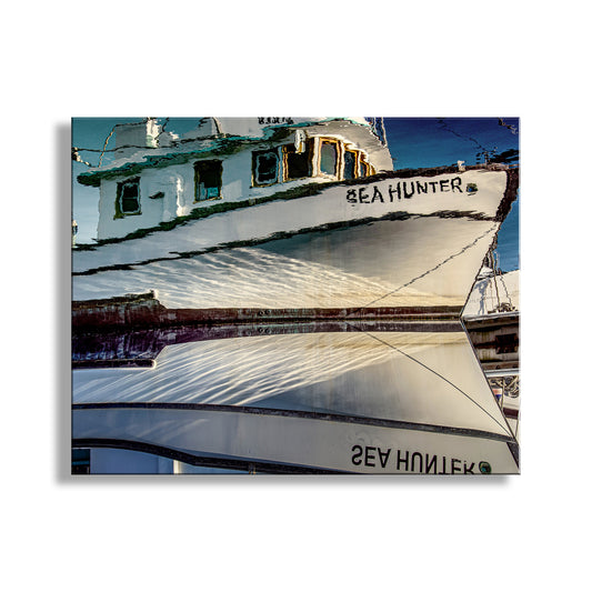 Reflective surface showing a boat named 'Sea Hunter' with clear blue sky. Fishing Boat Print Crescent City California as Nautical Wall Decor
